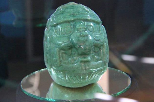 The Jade Head of Belize, a Maya Sun God carving from Altun Ha, displayed at the Museum of Belize.