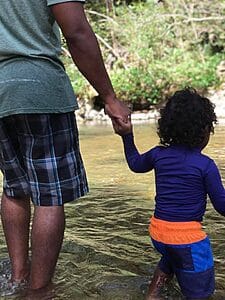 Alvin and second son at the river 2021