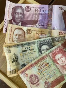 New banknotes Belize 2025 with George Price and Philip Goldson. new $50 and $20 with older $10 and $5