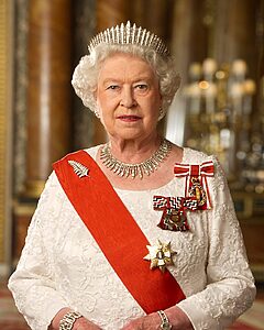 Official portrait of Queen Elizabeth II in white gown with red sash, as seen on historic Belizean banknotes.