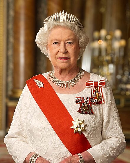 Official portrait of Queen Elizabeth II in white gown with red sash, as seen on historic Belizean banknotes.